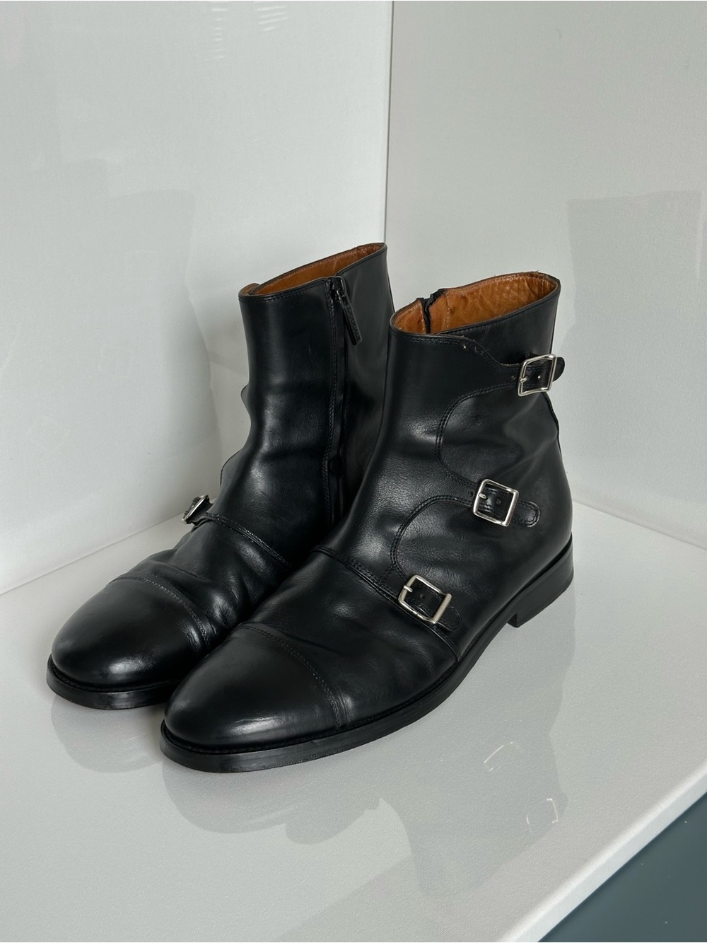 Doucal’s Made in Italy black genuine leather triple monk-strap ankle boots